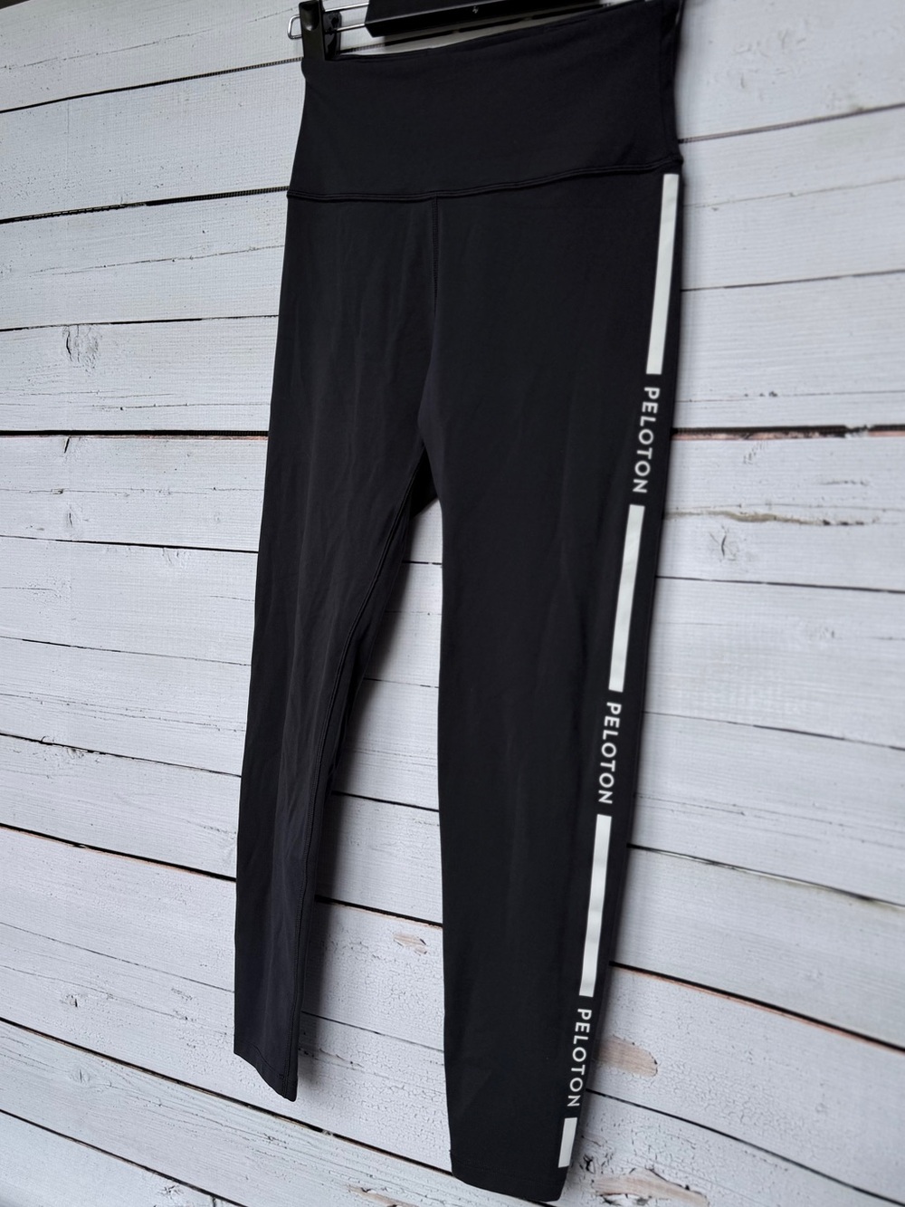 Peloton Black Leggings with White Side Logo Bars